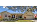 Beautiful one-story house with a two-car garage at 256 New River Dr, Poinciana, FL 34759