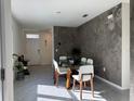 Dining room with glass table and access to entryway at 2843 Turnstone Run, Harmony, FL 34773