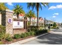 Randal Walk community entrance sign with townhomes in the background at 9475 Randal Park Blvd, Orlando, FL 32832