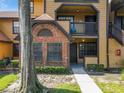 Brick and wood building exterior with a private entrance at 320 Forestway Cir # 102, Altamonte Springs, FL 32701