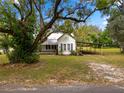 Quaint one-story home with mature trees and a spacious yard at 6106 Pine Nw Ave, Lakeland, FL 33810