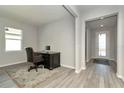 Spacious home office with wood floors at 1991 Spring Shower Cir, Kissimmee, FL 34744