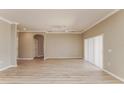 Spacious living room featuring hardwood floors and neutral tones at 279 Davinci Pass, Poinciana, FL 34759