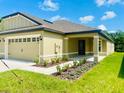 New construction home with covered patio at 3199 Seville St, Lake Alfred, FL 33850