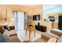 Open living room with kitchen and dining views at 2705 Bushman Dr, Kissimmee, FL 34746
