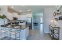 Modern kitchen with stainless steel appliances and granite countertops at 4063 Nw 44Th Cir, Ocala, FL 34482