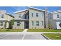 Modern two-story house with stone accents; new construction at 2857 Bookmark Dr, Kissimmee, FL 34746
