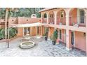 Charming courtyard with fountain and brick pavers at 8901 Nw 136Th Avenue Rd, Ocala, FL 34482