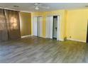 Spacious bedroom with neutral walls and wood-look tile floors at 13659 Sw 115Th Pl, Dunnellon, FL 34432