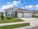Beautiful two-story house with a three-car garage at 7474 Sw 78Th Ter, Ocala, FL 34481