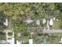 Aerial view showing a home nestled among lush greenery at 3603 Cr 626N, Bushnell, FL 33513