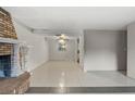 Bright living room with tile floors and access to kitchen at 2800 S Park Ave, Sanford, FL 32773