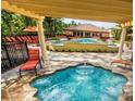 Relaxing community spa with comfortable seating at 8157 Roseville Blvd, Davenport, FL 33896