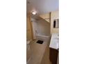 Bathroom with jetted bathtub and vanity at 4000 Santa Maria Dr # 108, Kissimmee, FL 34741