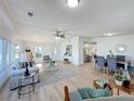 Bright and airy living room with hardwood floors and open concept floorplan at 1622 Tally Ho Dr, Lakeland, FL 33810