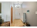 Bright and spacious entryway with tiled flooring and storage at 2517 Timbercreek W Loop, Lakeland, FL 33805