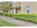 Townhouse exterior with manicured landscaping at 5333 River Rock Rd, Lakeland, FL 33809