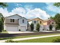 Modern townhouses with attached garages at 4313 Hillock Blvd, Haines City, FL 33844