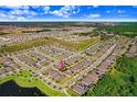 Aerial view showing home's location in a residential neighborhood at 251 Tomelloso Way, Davenport, FL 33837