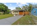 Charming craftsman style home with a modern covered carport at 1236 6Th Ne St, Winter Haven, FL 33881