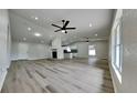 Spacious living room featuring hardwood floors and recessed lighting at 1646 Center St, Deland, FL 32720