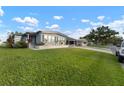 Side view of manufactured home showing additional landscaping at 1610 Reynolds Rd # 159, Lakeland, FL 33801