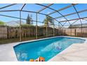 Refreshing screened-in pool, perfect for relaxation at 2622 Montego Bay Blvd, Kissimmee, FL 34746