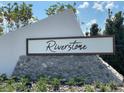 Riverstone community entrance sign with modern design and stonework at 5688 Siltstone St, Lakeland, FL 33811