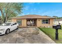 Well-maintained single story home with a driveway at 1375 6 Iron Dr, Lakeland, FL 33801