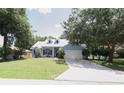 Charming light blue house with a spacious yard at 2819 Ne 25Th St, Ocala, FL 34470