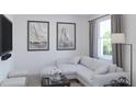 Bright living room with a sectional sofa and large windows at 2651 Candied Apple Aly, Kissimmee, FL 34744