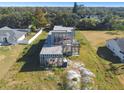 Under construction modern home with surrounding undeveloped land at 3225 Parkwood Ct, Kissimmee, FL 34744