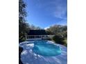 Inviting kidney-shaped pool with a large backyard at 6611 Hereford Dr, Lakeland, FL 33810