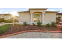 House exterior showcasing architectural details and landscaping at 17090 Se 76Th Caledonia Ter, The Villages, FL 32162