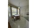 Bright breakfast nook with window and small table at 3323 Songbird Ln, Lakeland, FL 33811