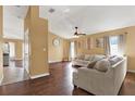 Spacious living room with hardwood floors and lots of natural light at 1771 Turtle Rock Dr, Lakeland, FL 33803