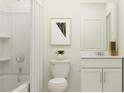 Clean bathroom featuring a shower/tub combo and white vanity at 4160 Singing Mockingbird Blvd, Bartow, FL 33830