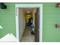 Open door revealing the interior entryway and hallway at 606 Gran Bahama Boulevard # 29-606, Davenport, FL 33897