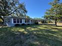 Ranch-style home with carport and spacious yard at 2331 Olney Rd, Lakeland, FL 33801
