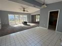 Spacious living room with tile and carpet floors at 2331 Olney Rd, Lakeland, FL 33801
