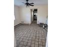 Bright dining area with kitchen access and tile floors at 748 Merrimac Dr, Port Orange, FL 32127