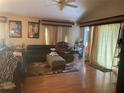 Living room with hardwood floors and neutral decor at 6131 Sabal Point Cir, Port Orange, FL 32128