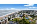 Aerial view of beachfront property and surrounding neighborhood at 2700 Ocean Shore Blvd # 111, Ormond Beach, FL 32176