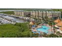 Aerial view of waterfront community with pool at 4672 Riverwalk Village Ct # 8201, Ponce Inlet, FL 32127