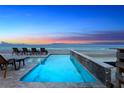 Relaxing beachside pool with stunning ocean sunset views at 4111 S Atlantic Ave, Port Orange, FL 32127