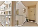 Building hallway with light walls and flooring at 3 Oceans West Blvd # 5C4, Daytona Beach Shores, FL 32118