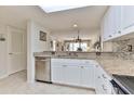 Updated kitchen with granite countertops and stainless steel appliances at 4 Oceans West Blvd # 208C, Daytona Beach Shores, FL 32118
