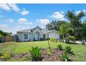 One-story house with landscaped yard at 337 Orange Ave, Orange City, FL 32763