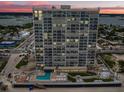 High-rise building with pool, beach access, and ocean views at 3425 S Atlantic Ave # 1105, Daytona Beach Shores, FL 32118