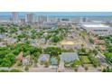 Aerial view of a teal house near the beach and city at 216 N Halifax Ave, Daytona Beach, FL 32118